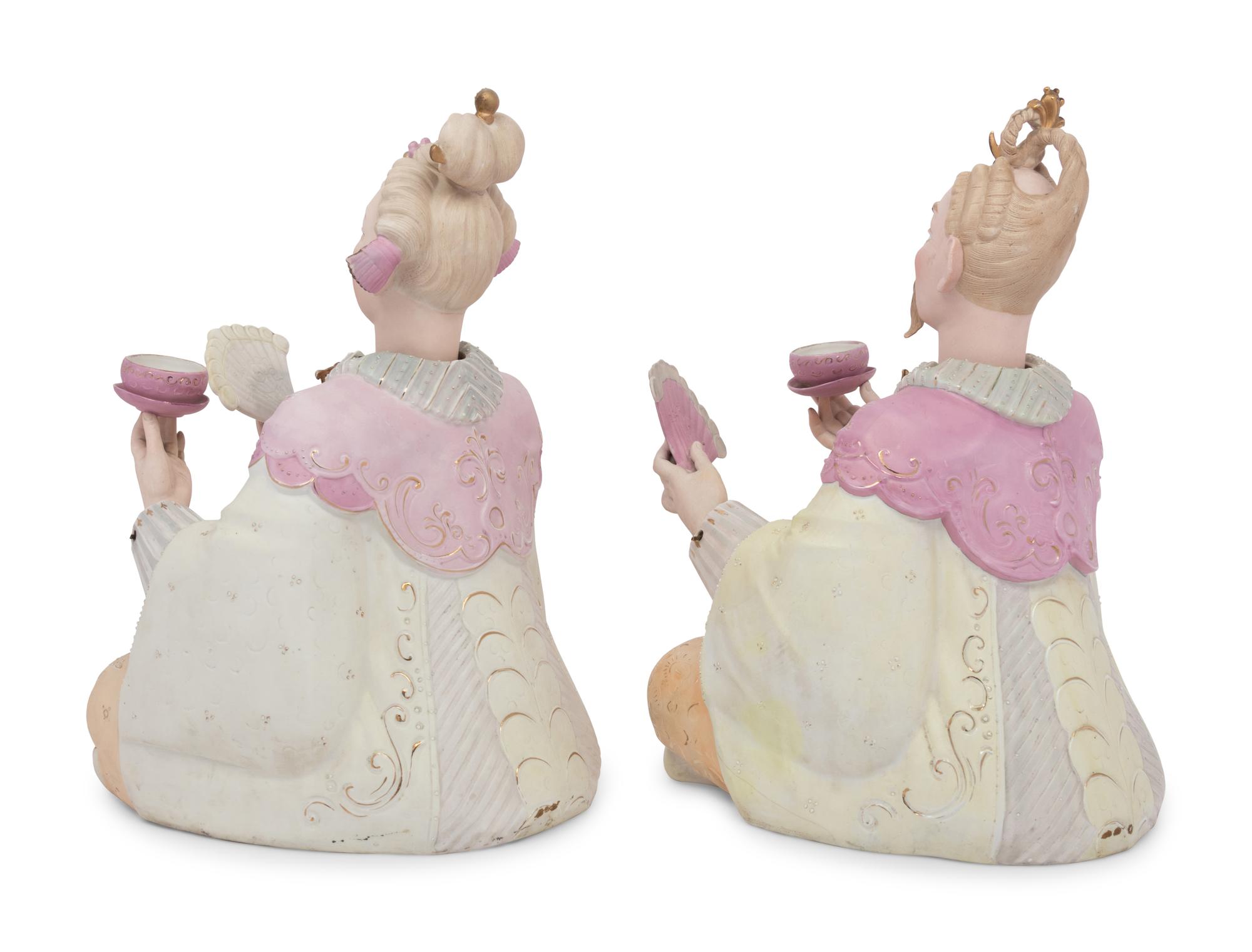 A Pair of German Porcelain “Nodder” Figures