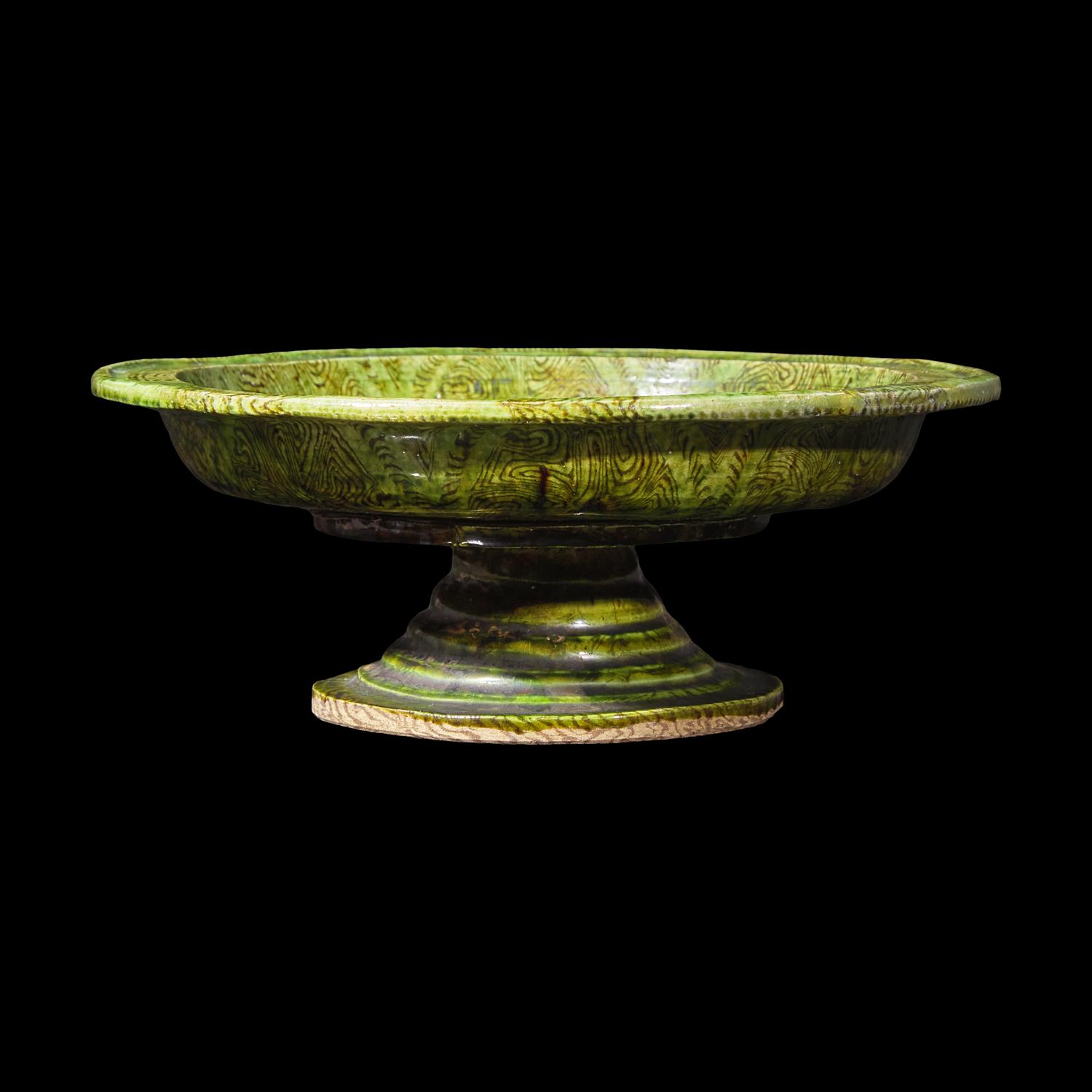 A Chinese Green Glazed Marbled Stem Dish, Possibly Tang Dynasty 或爲唐 綠釉絞胎高足盤