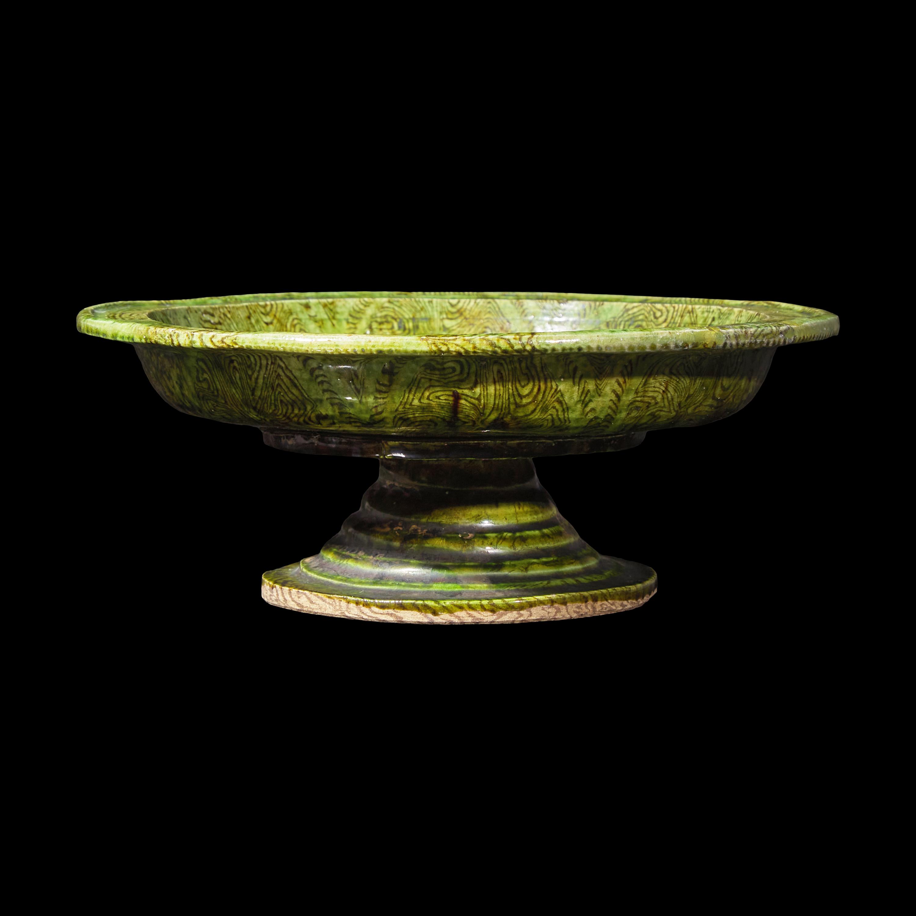 A Chinese Green Glazed Marbled Stem Dish, Possibly Tang Dynasty 或爲唐 綠釉絞胎高足盤