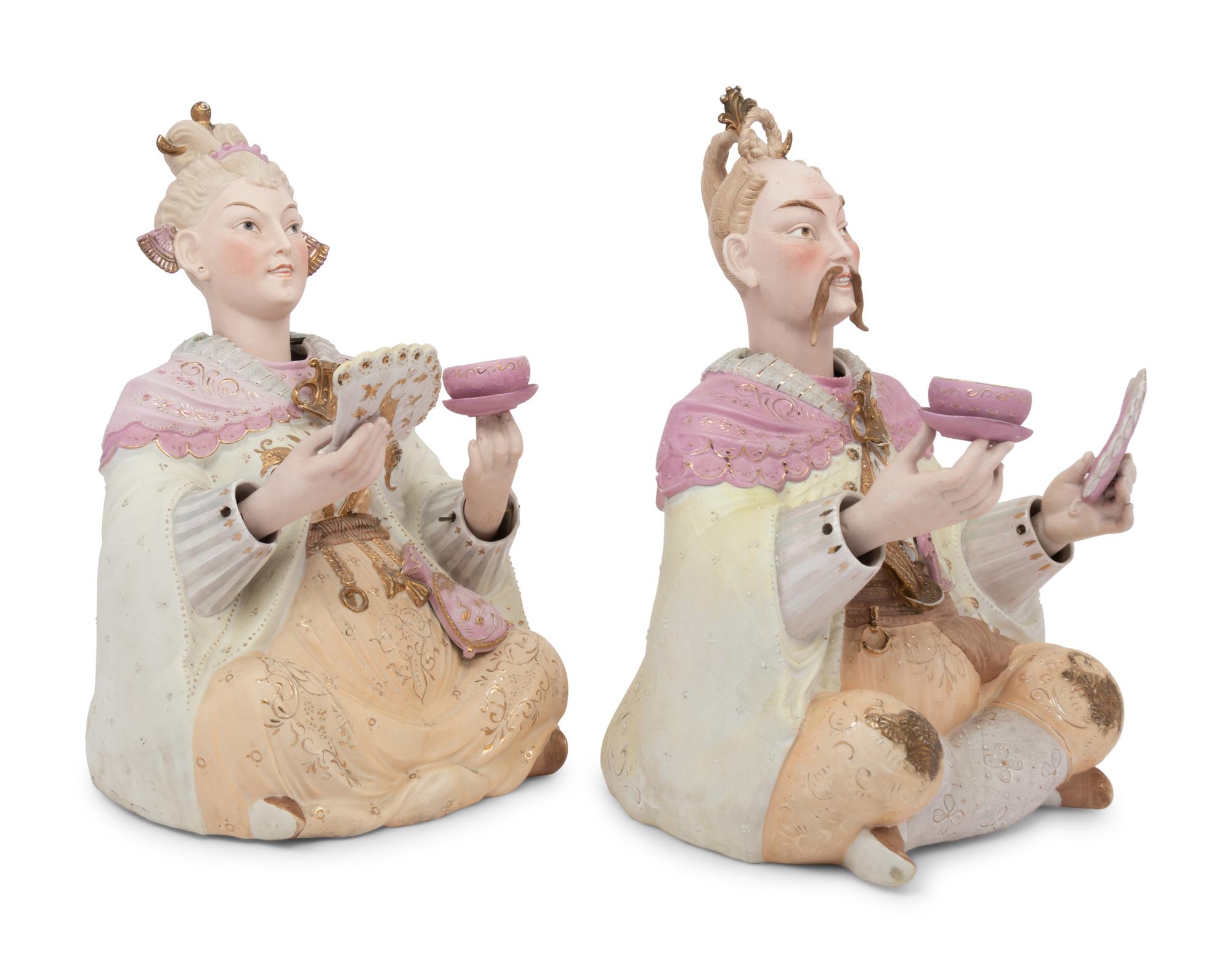 A Pair of German Porcelain “Nodder” Figures