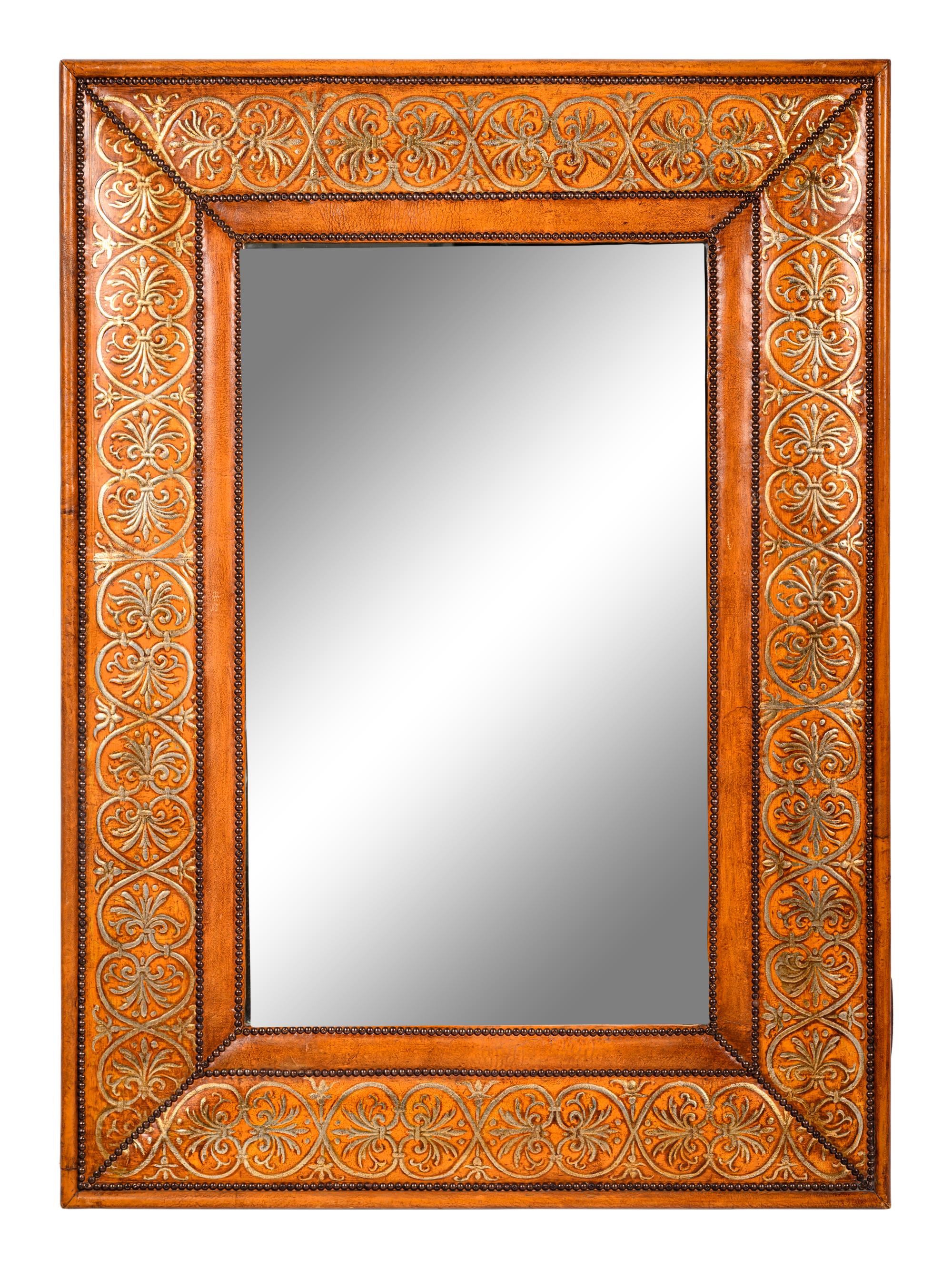 A Gilt Decorated Leather Mirror