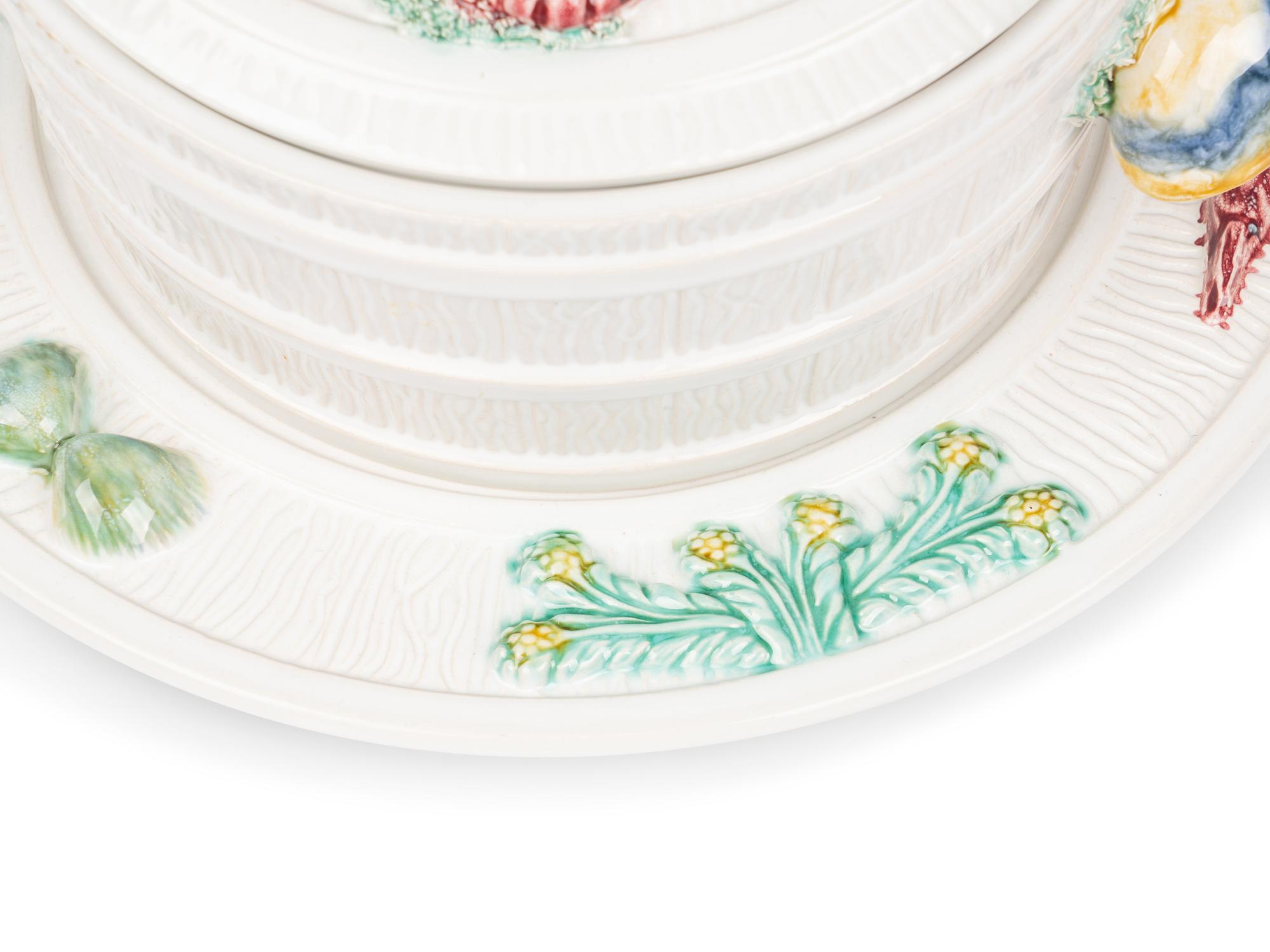 A Mottahedeh Glazed Earthenware Seafood Tureen and Tray