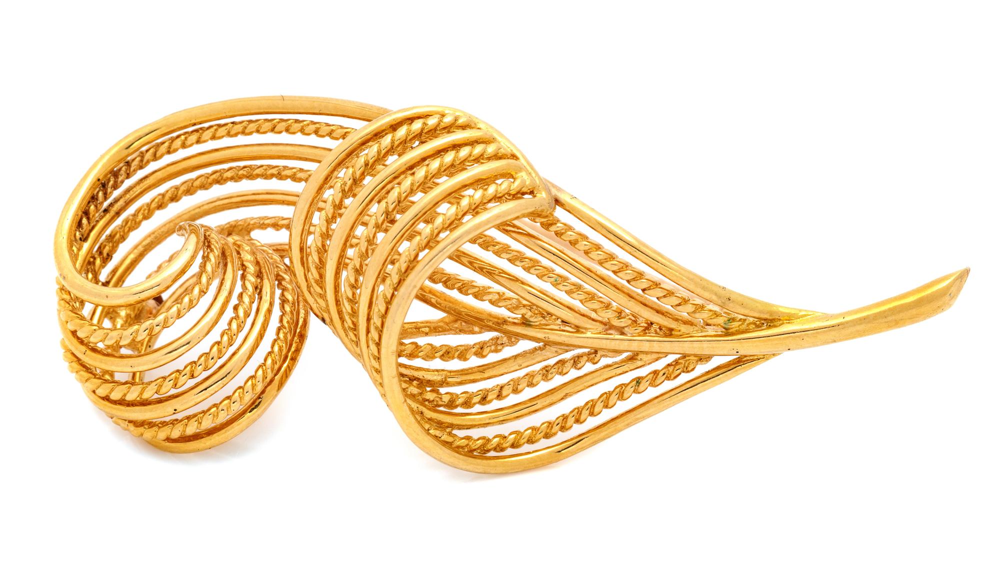 An 18 Karat Yellow Gold Brooch,