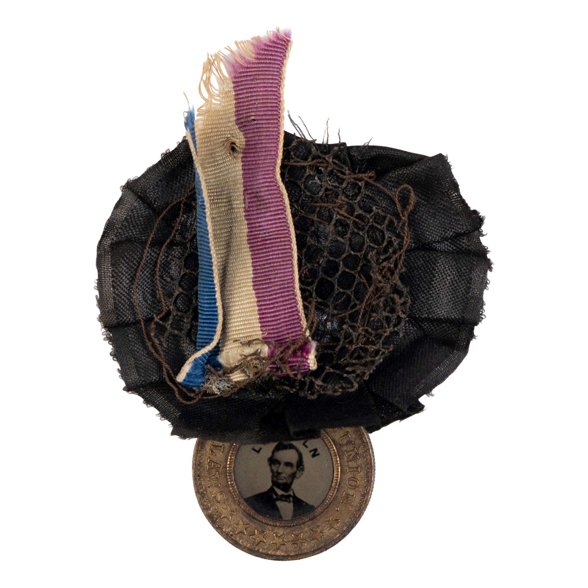 [LINCOLN FUNERAL]. A group of 4 mourning badges and 1 campaign badge, comprising: