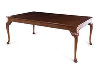 A Baker George II Style Walnut Dining Table