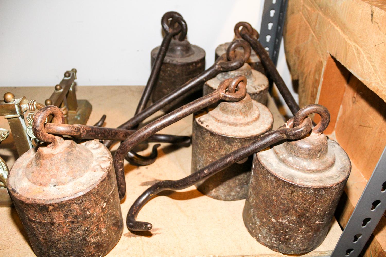 A Group of Six Hanging Weights Diameter 6 1/2 inches.