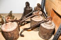 A Group of Six Hanging Weights Diameter 6 1/2 inches.