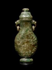 A Carved Spinach Green Jade Ring-Handled Vase and Cover
