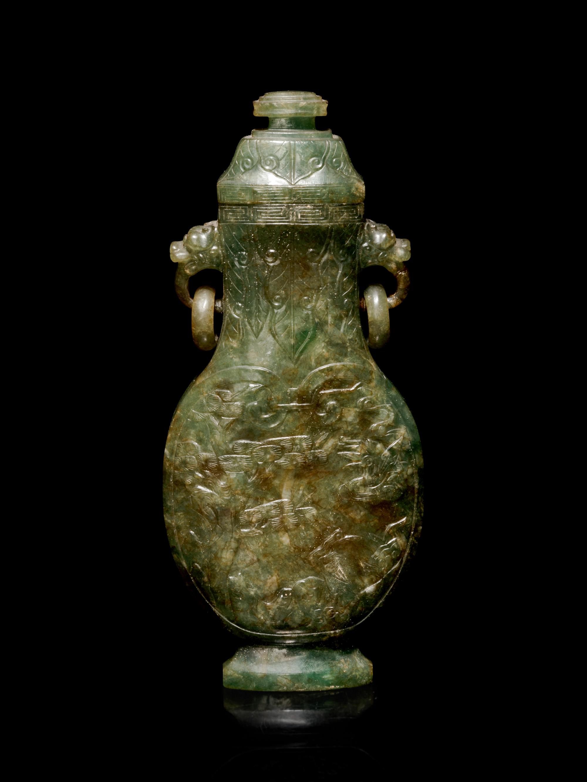 A Carved Spinach Green Jade Ring-Handled Vase and Cover
