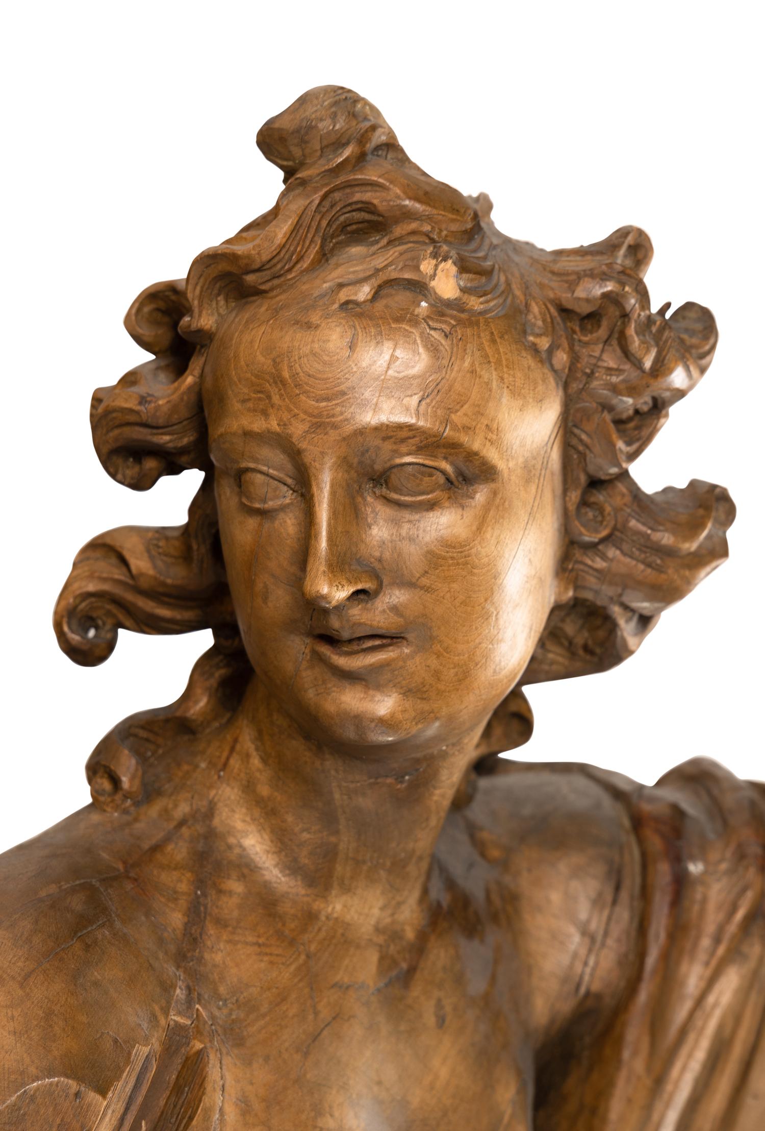 A Continental Carved Wood Figure