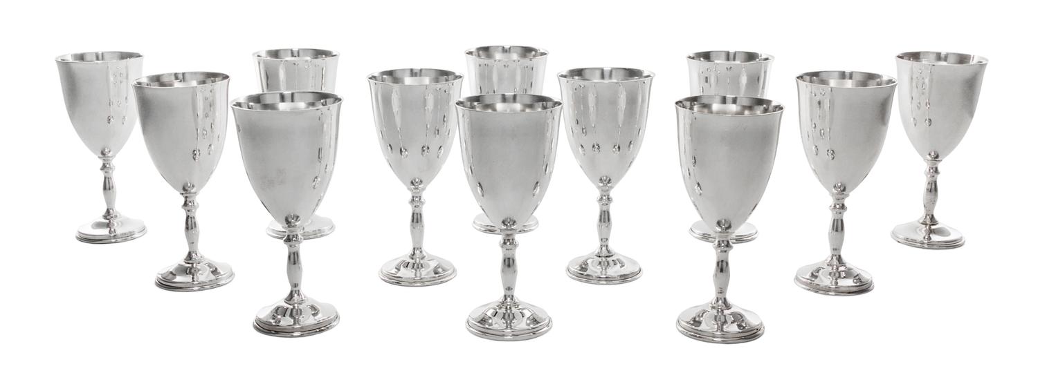 A Set of Twelve Mexican Silver Cordials, Maker's Mark MMR, with baluster form stems ending in circular feet.