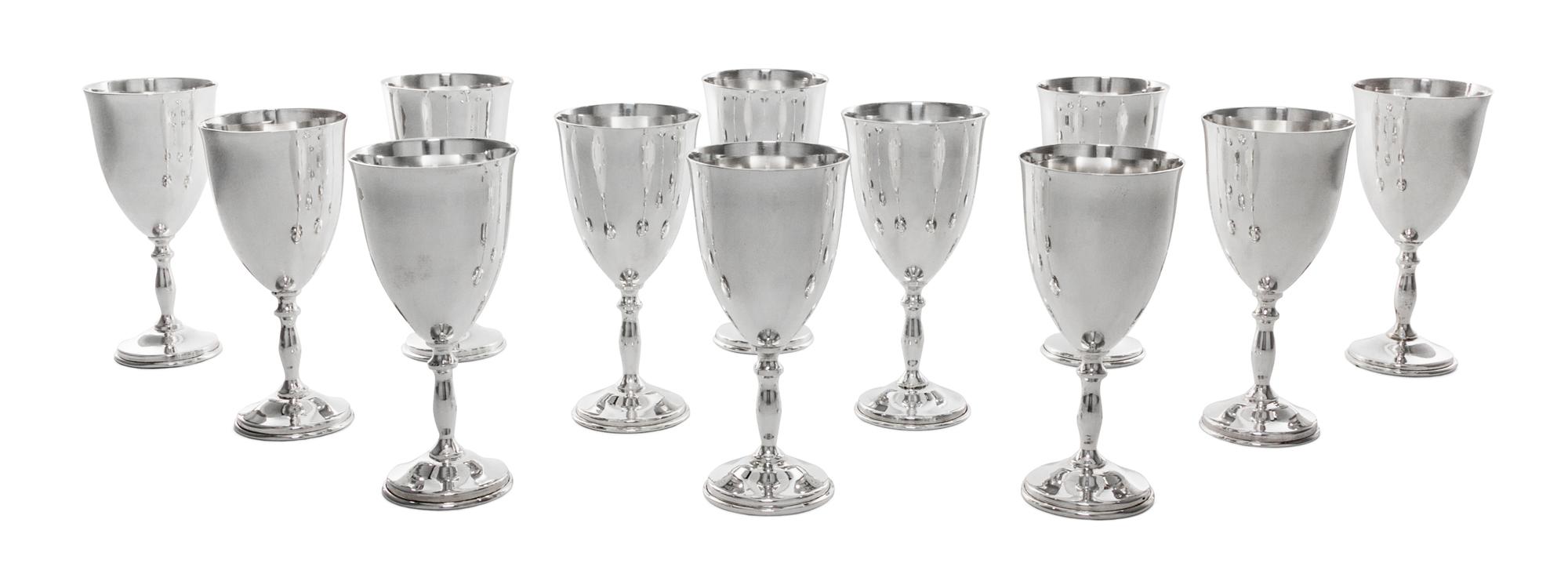 A Set of Twelve Mexican Silver Cordials, Maker's Mark MMR, with baluster form stems ending in circular feet.