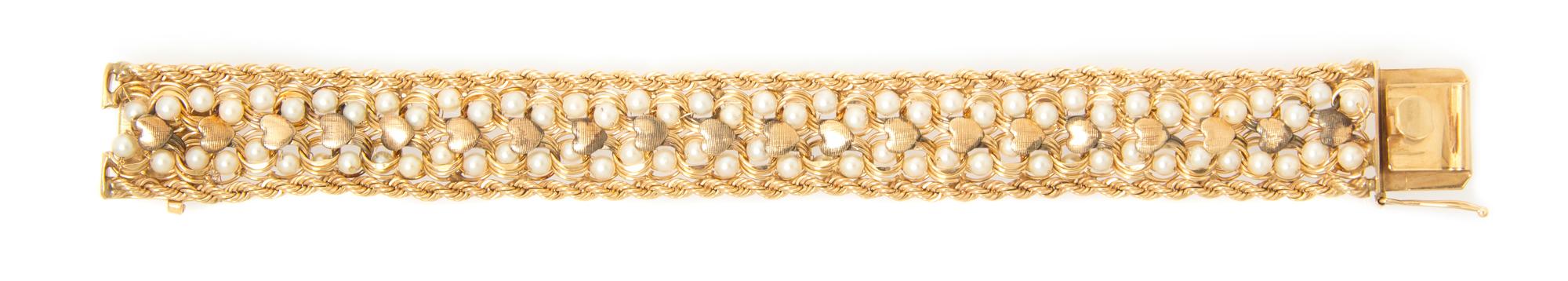 A 14 Karat Yellow Gold and Cultured Pearl Bracelet, 29.80 dwts.