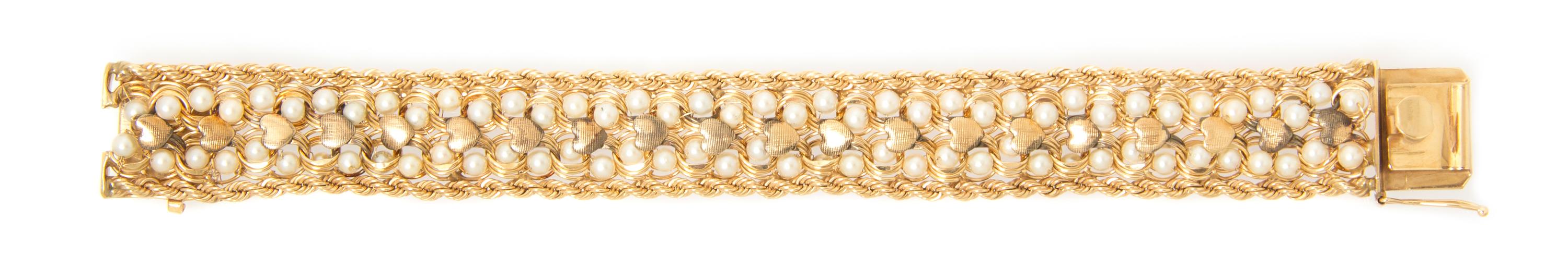 A 14 Karat Yellow Gold and Cultured Pearl Bracelet, 29.80 dwts.