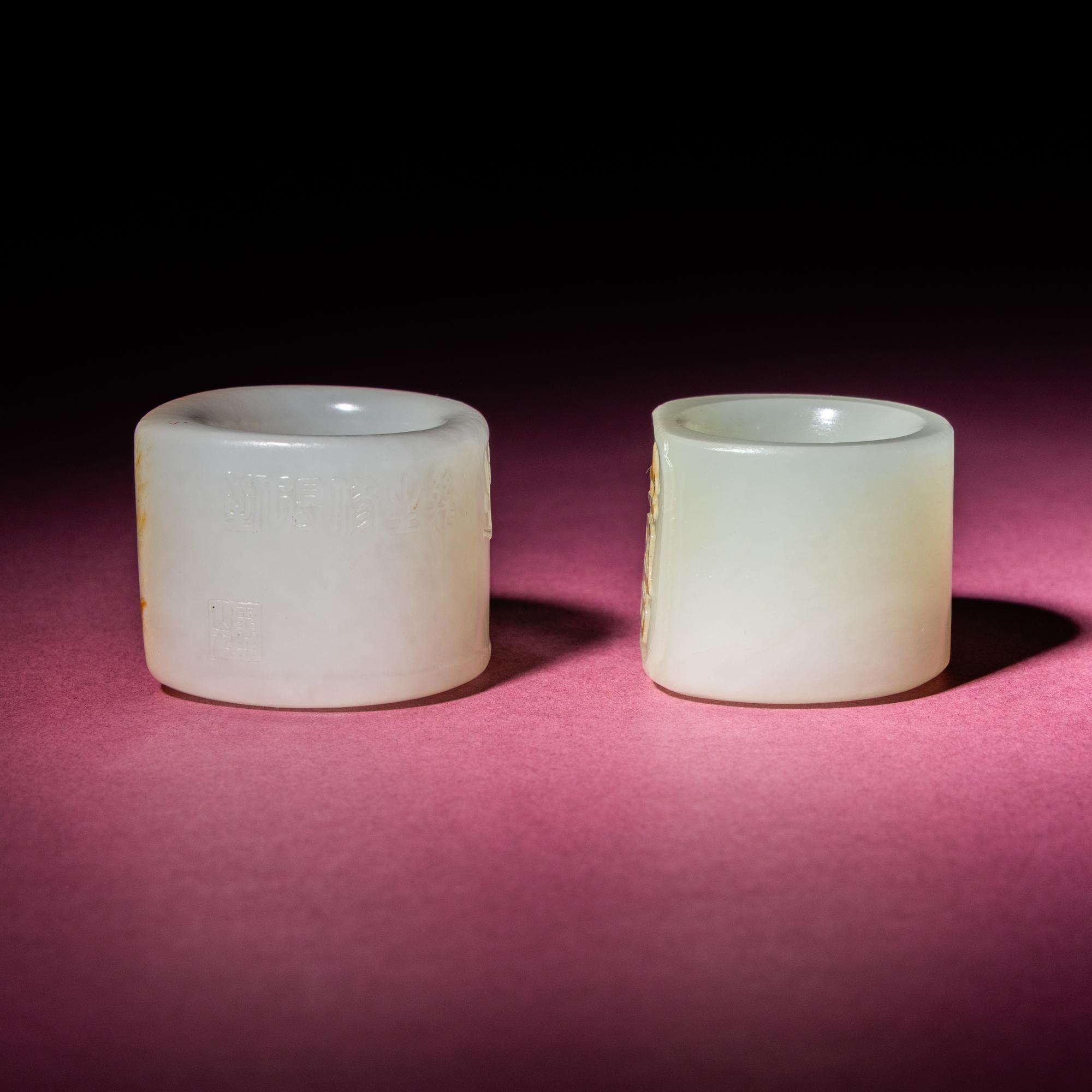 Two Chinese Jade Archer's Rings, 18th/19th Century — 清中期 白玉留皮扳指兩枚