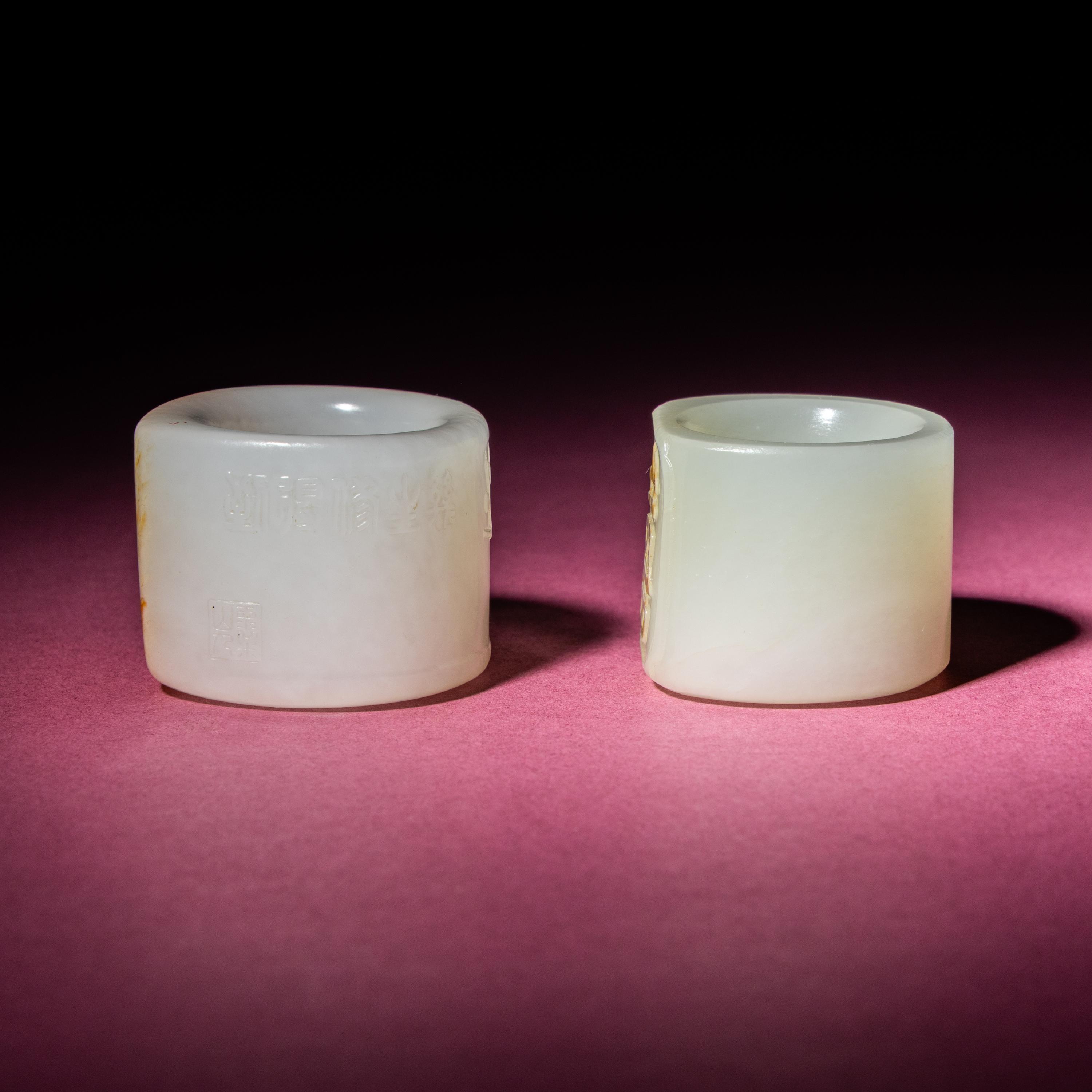 Two Chinese Jade Archer's Rings, 18th/19th Century — 清中期 白玉留皮扳指兩枚