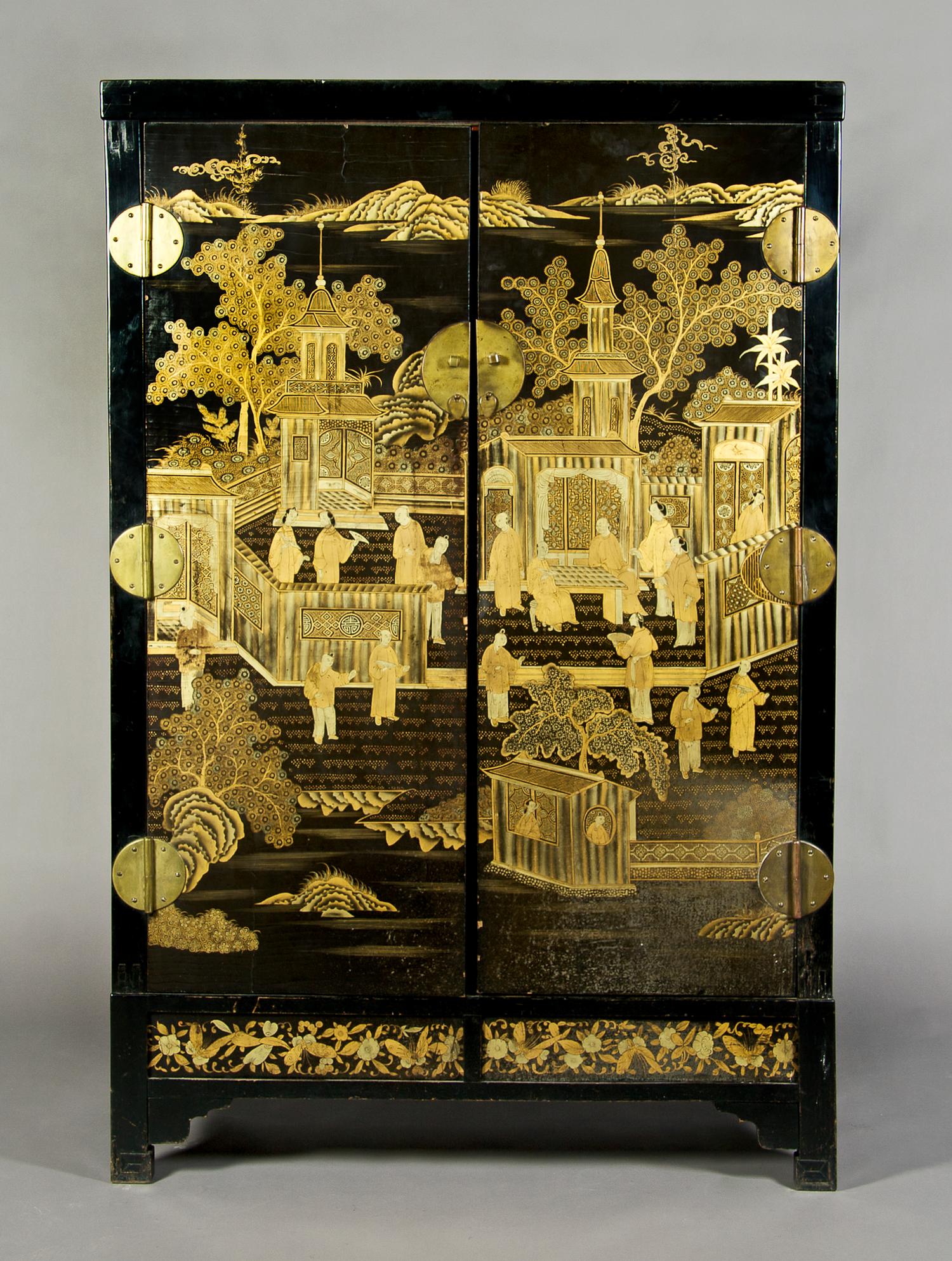 A Chinese Black Lacquered Cabinet on Stand, Height 71 1/2 x width 46 1/2 x depth 17 3/4 inches.