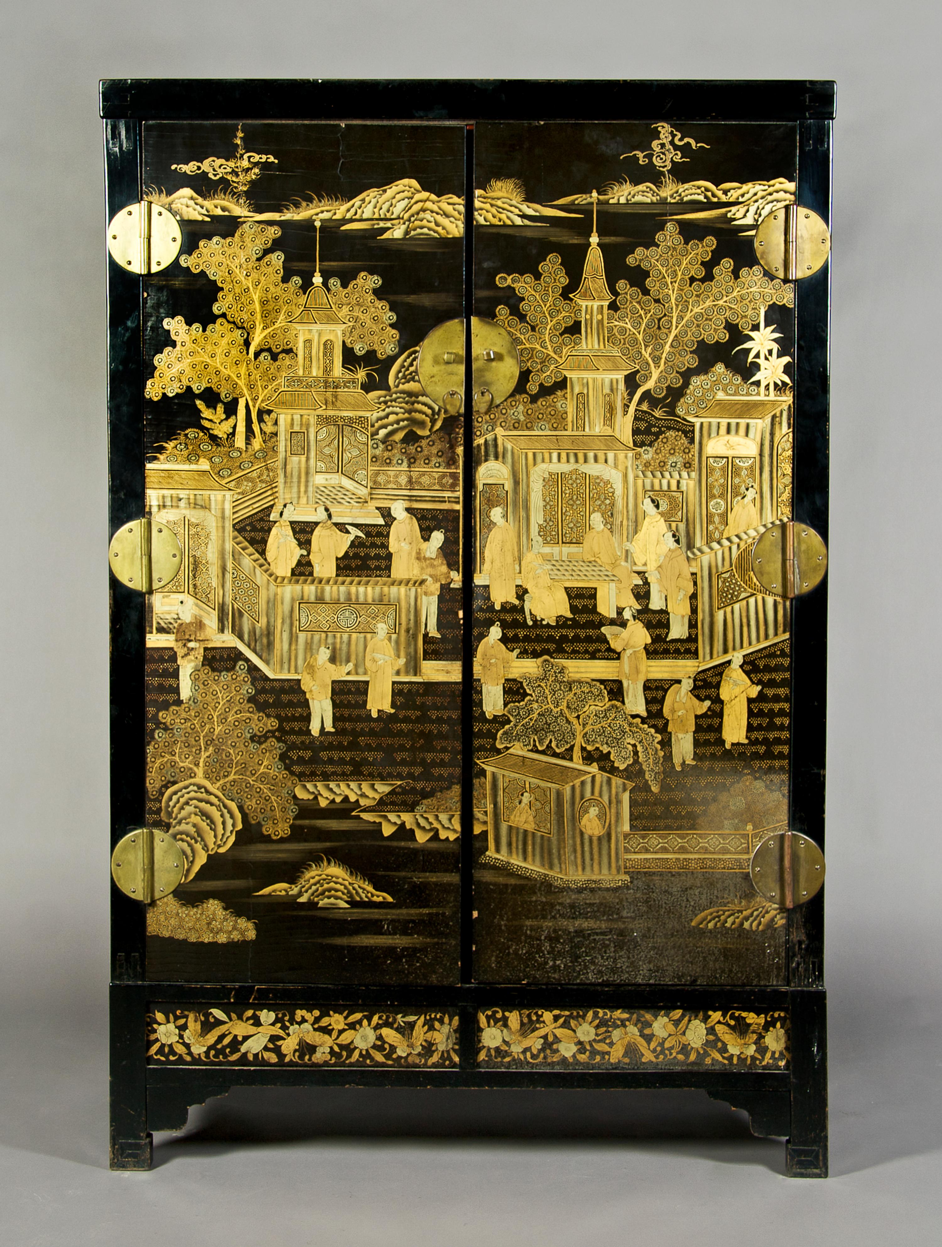 A Chinese Black Lacquered Cabinet on Stand, Height 71 1/2 x width 46 1/2 x depth 17 3/4 inches.