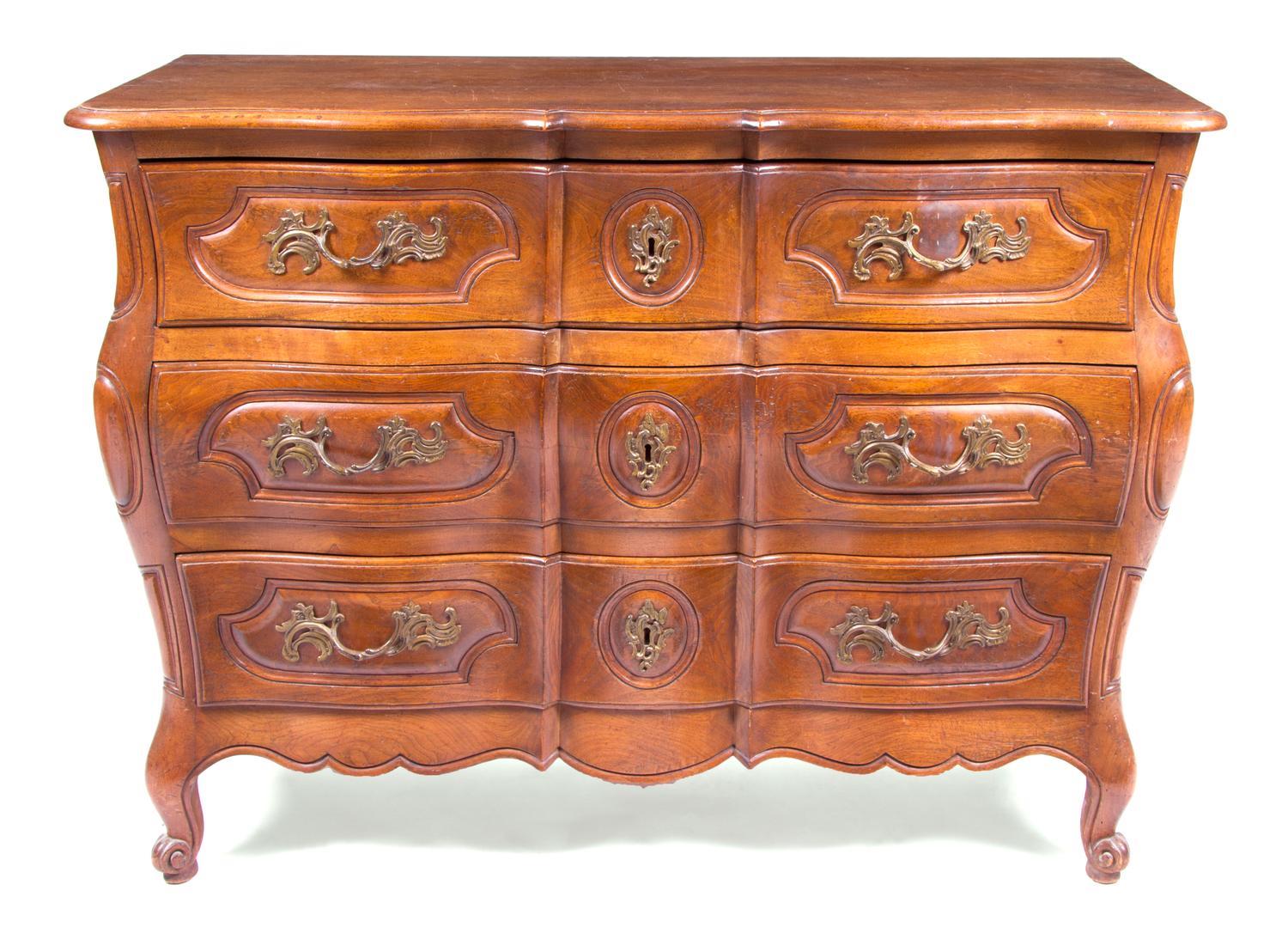 A Louis XV Provincial Style Commode Height 35 x width 50 x depth 21 1/4 inches. — 20TH CENTURY