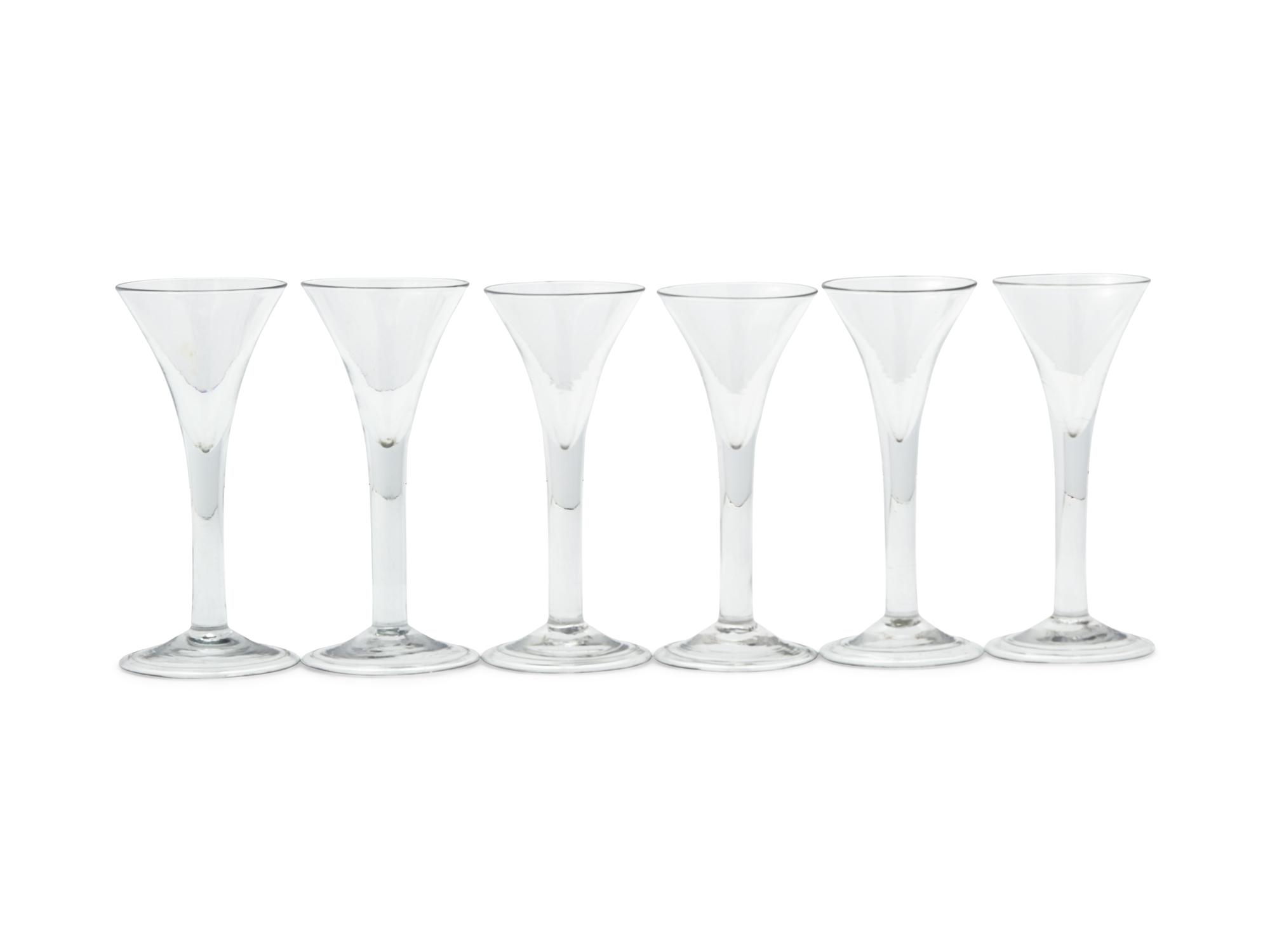A Set of Six George III Blown Wine Glasses