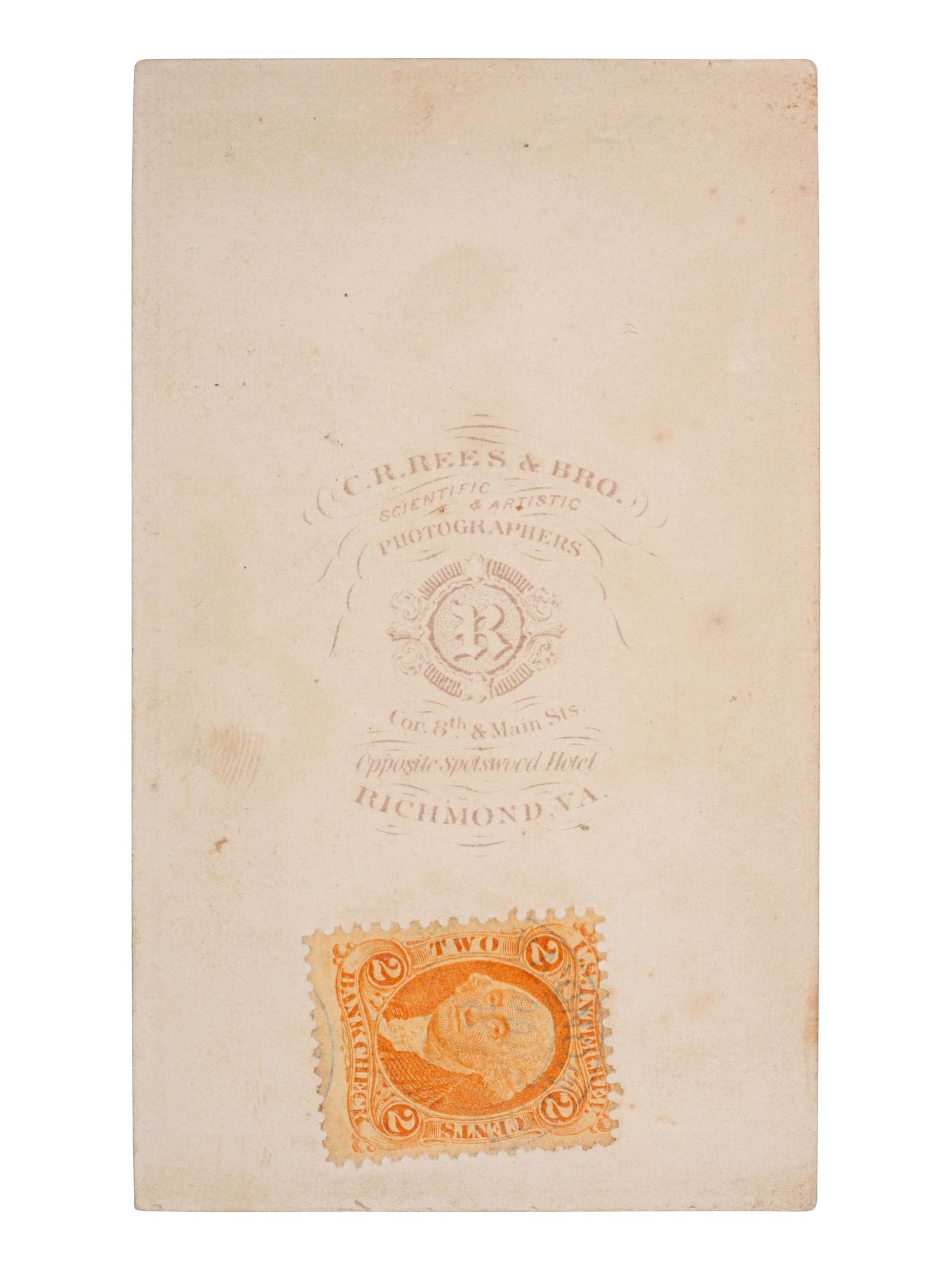[AFRICAN AMERICANA]. Early post-bellum CDV of a female African American domestic worker standing in a garden behind a seated white gentleman. Richmond, VA: C. R. Rees & Bro, [1866].