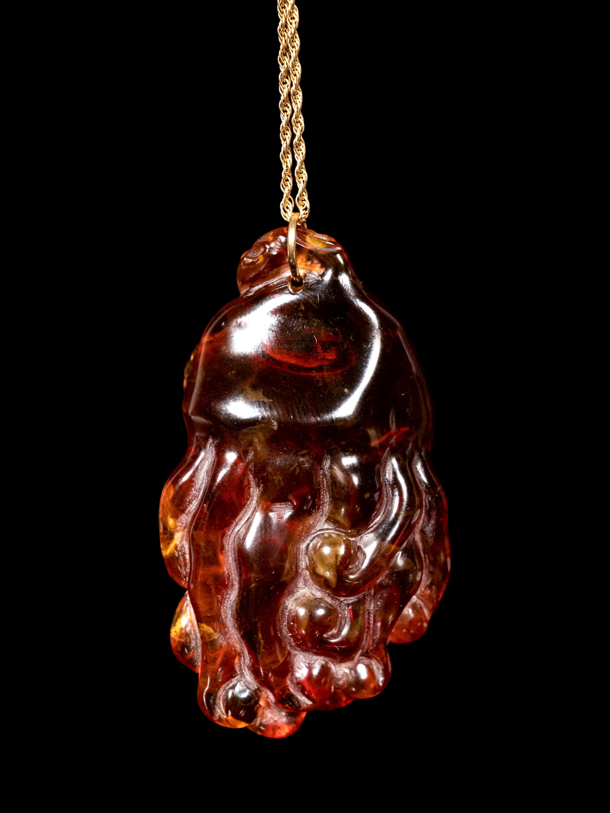 Two Chinese Precious Stone Buddha's Hand Citron-Form Pendants