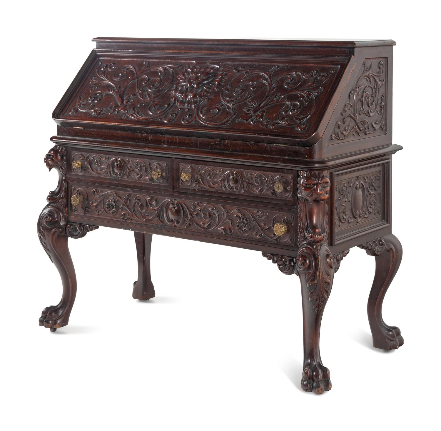A Renaissance Revival Carved Mahogany Slant-Front Bureau
