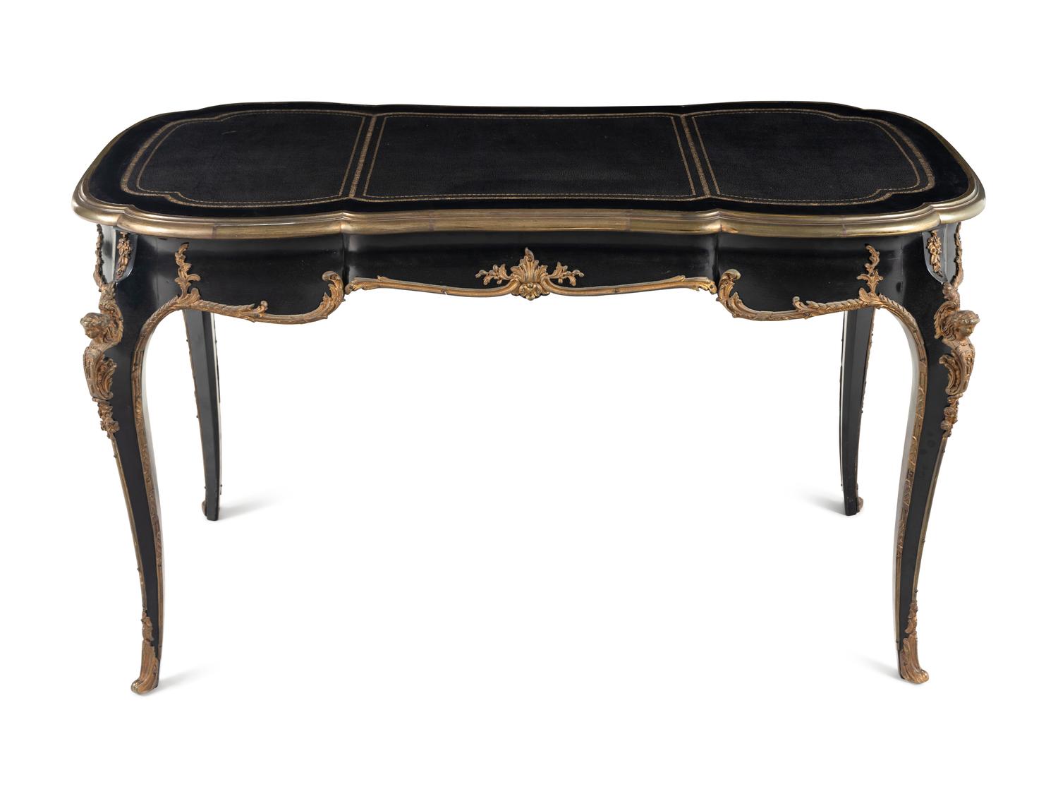 A Louis XV Style Gilt-Metal Mounted Ebonized Bureau Plat