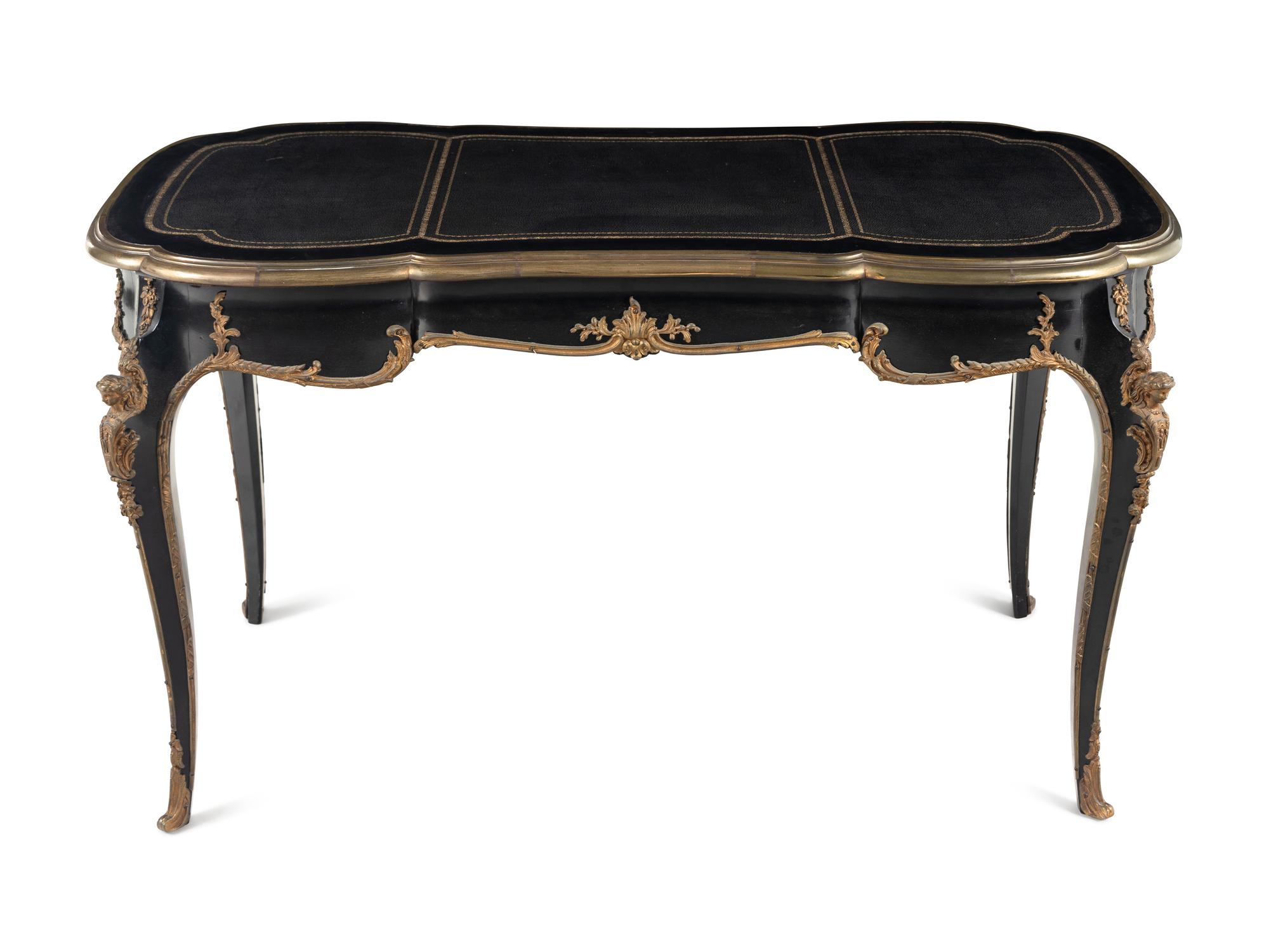 A Louis XV Style Gilt-Metal Mounted Ebonized Bureau Plat