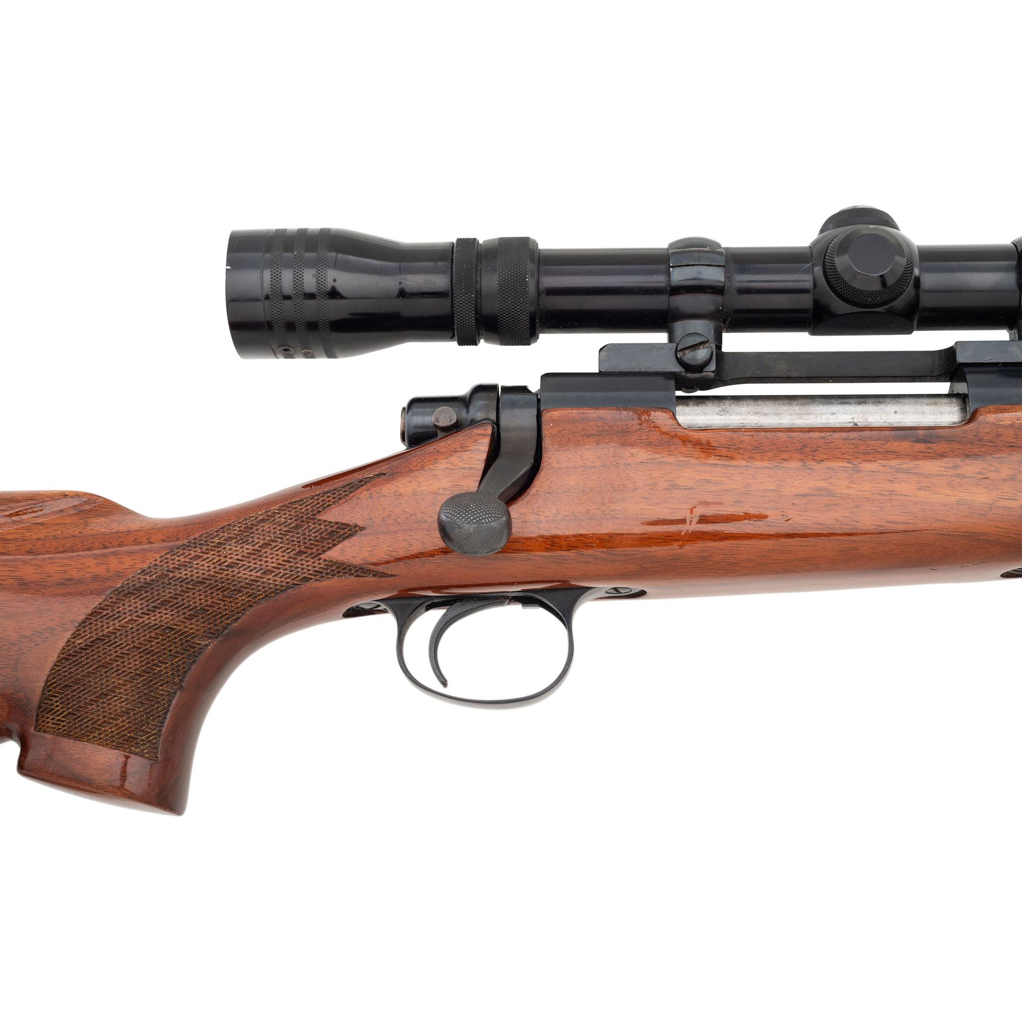 * Remington Model 700 with Scope