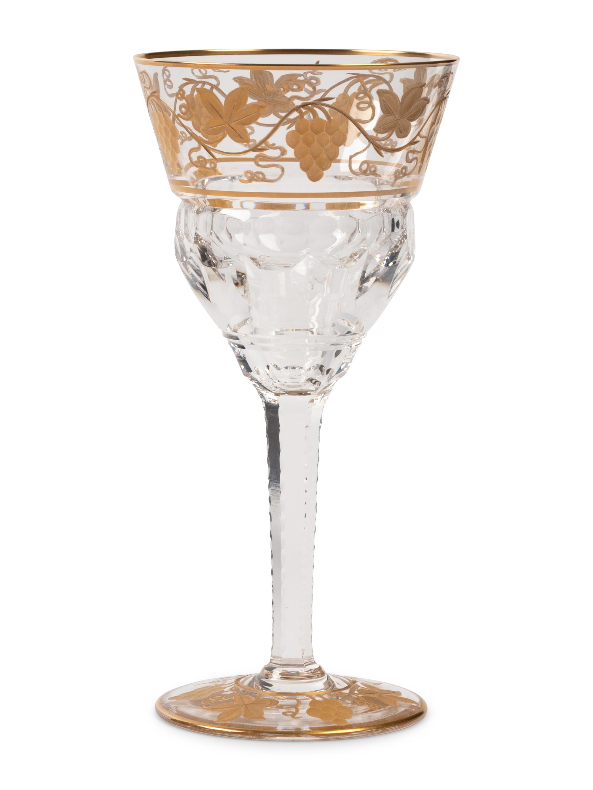 A Val Saint Lambert Gilt Decorated Cut Glass Table Service