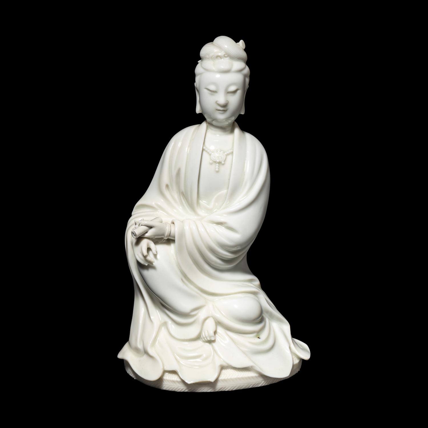 A Chinese Blanc-de-Chine Porcelain Figure of Guanyin, Late Qing/Republic Period 晚清/民國 德化白瓷書卷觀音