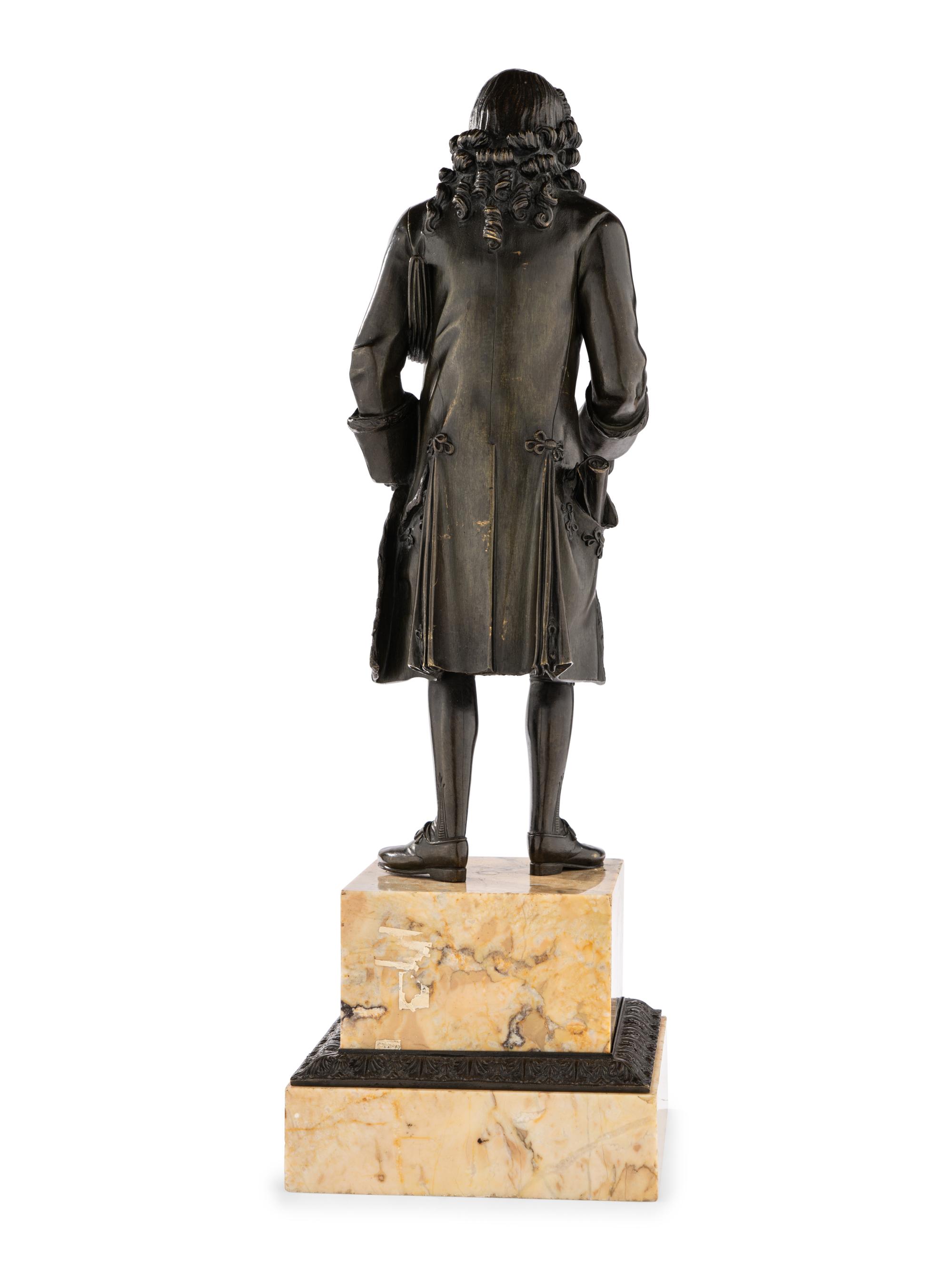 A Pair of French Bronze and Sienna Marble Sculptures of Voltaire and Rousseau