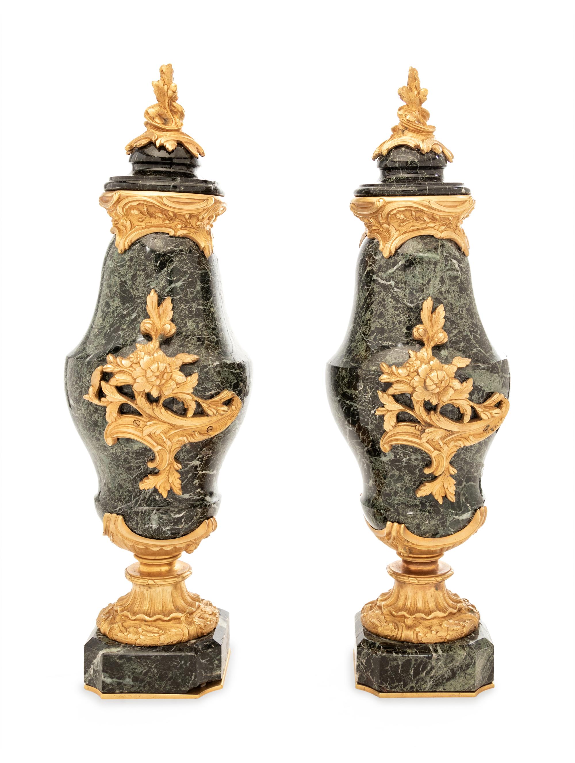 A Pair of Continental Gilt Bronze Mounted Marble Urns