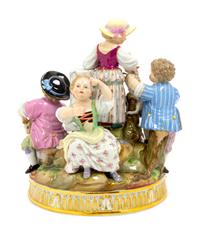 A Meissen Porcelain Figural Group of Children with Lambs and a Dog