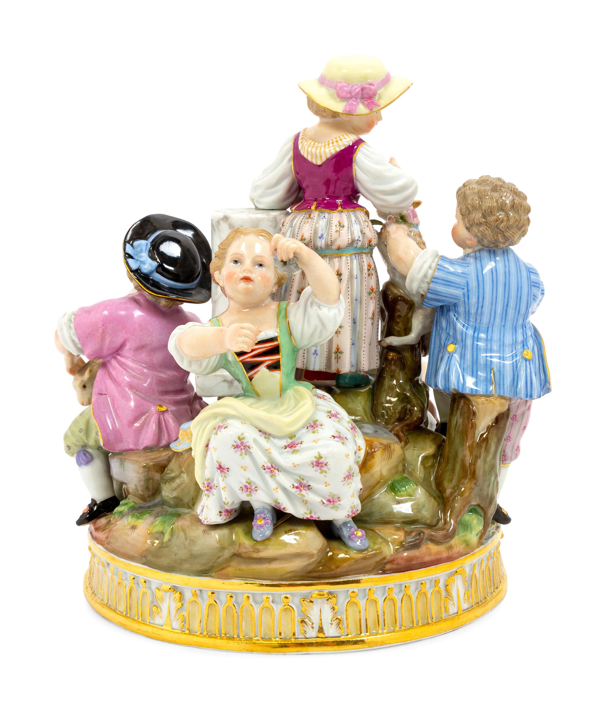 A Meissen Porcelain Figural Group of Children with Lambs and a Dog