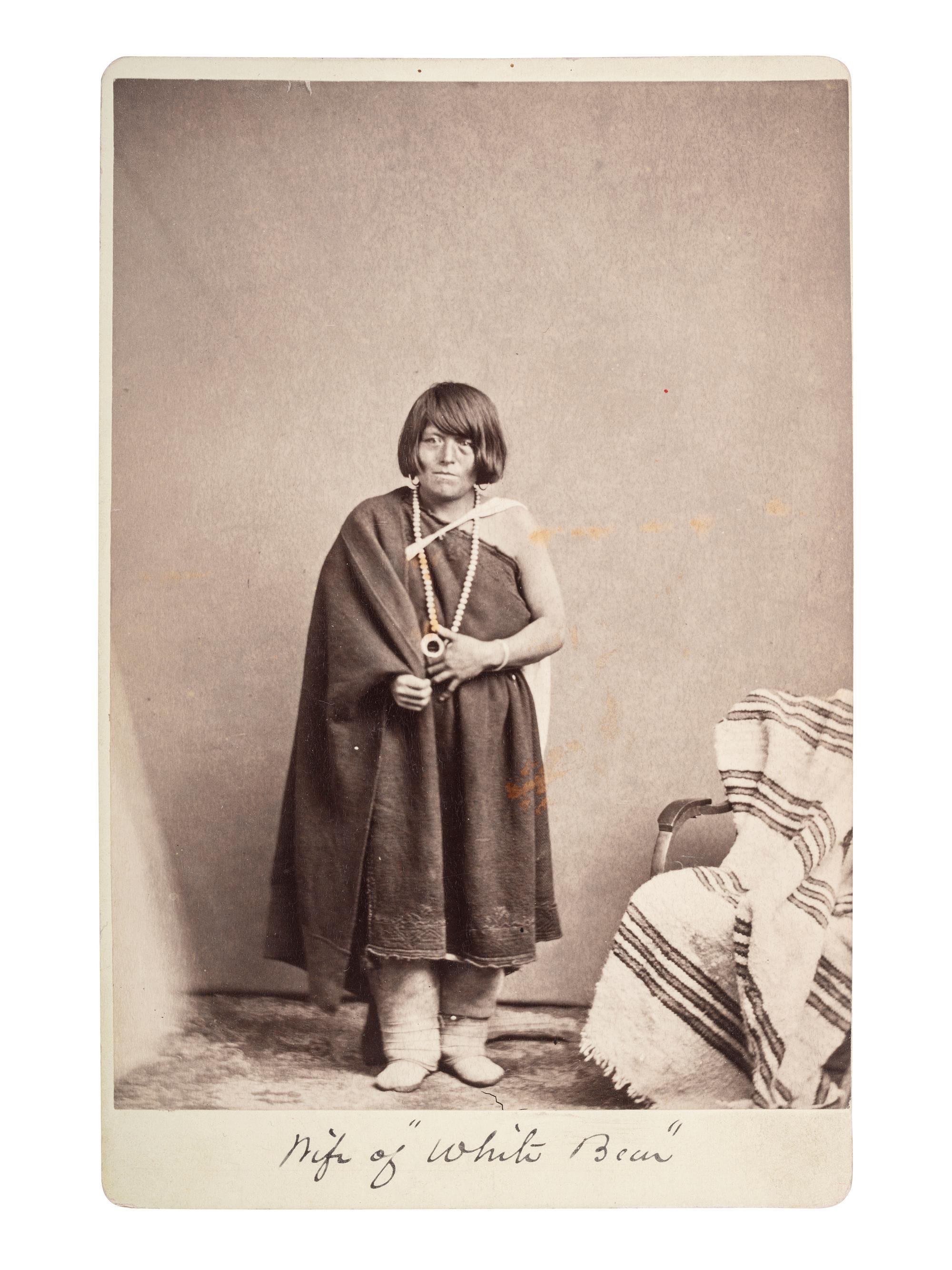 [NATIVE AMERICANS]. Cabinet card featuring a Native American woman with short hair, possibly the wife of Satanta, or "White Bear."