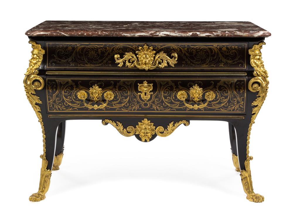 <div><!--block--><strong>A Louis XV Gilt Bronze Mounted Ebony Commode</strong></div>