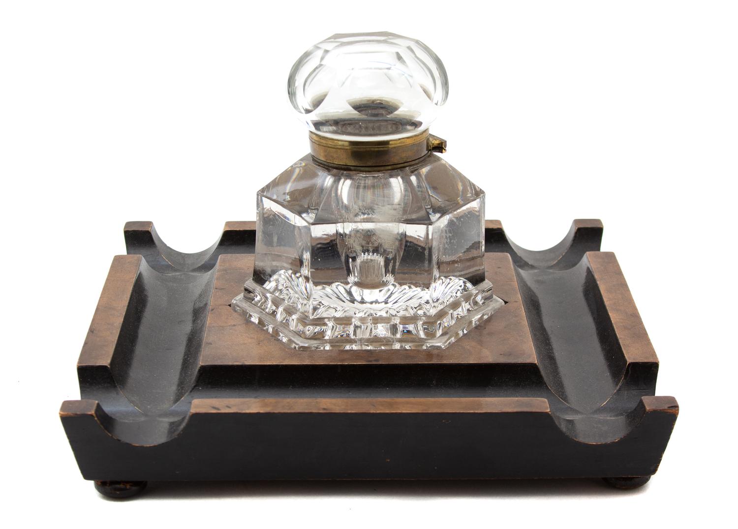 An English Walnut, Parcel Ebonized and Cut Glass Inkwell Height 6 3/4 x 10 1/4 inches square. — 19TH CENTURY