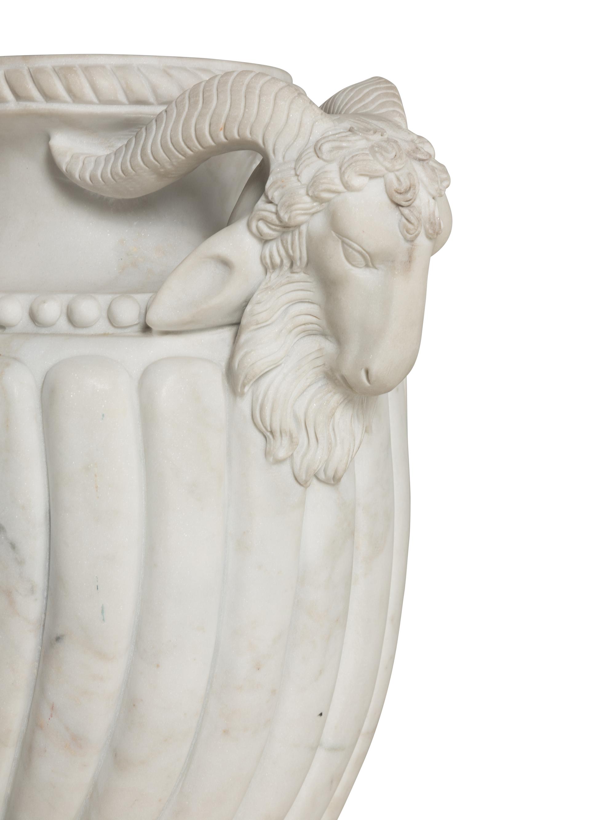 A Pair of Neoclassical Style Marble Urns