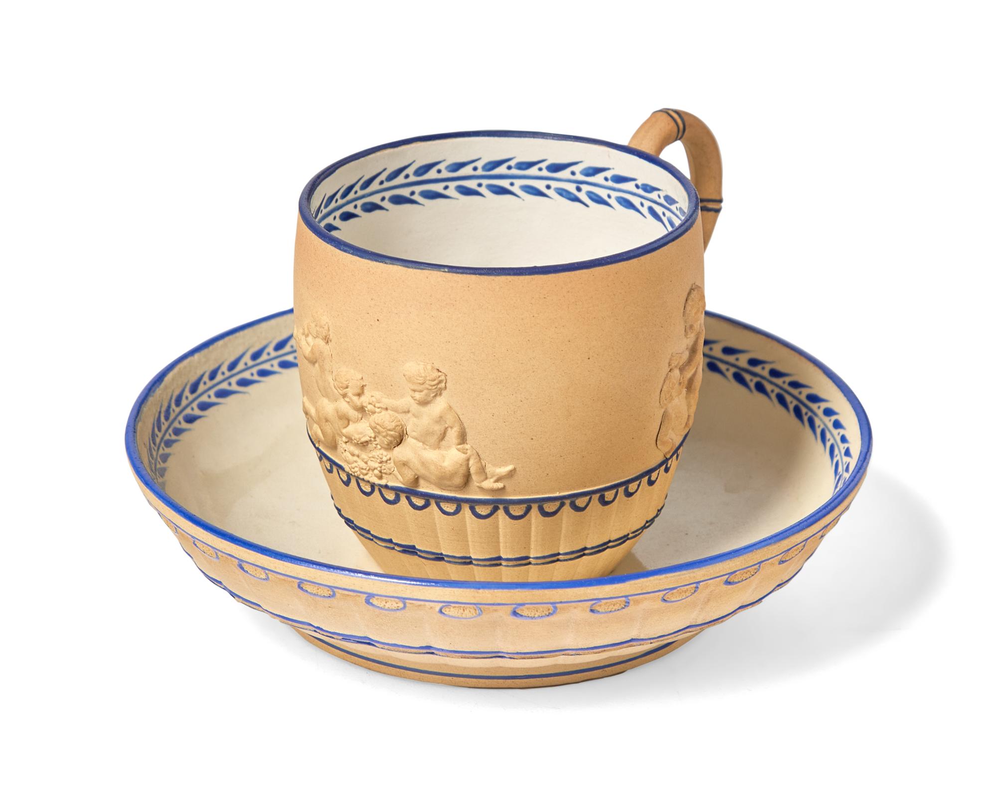 A Wedgwood Caneware Teacup and Saucer