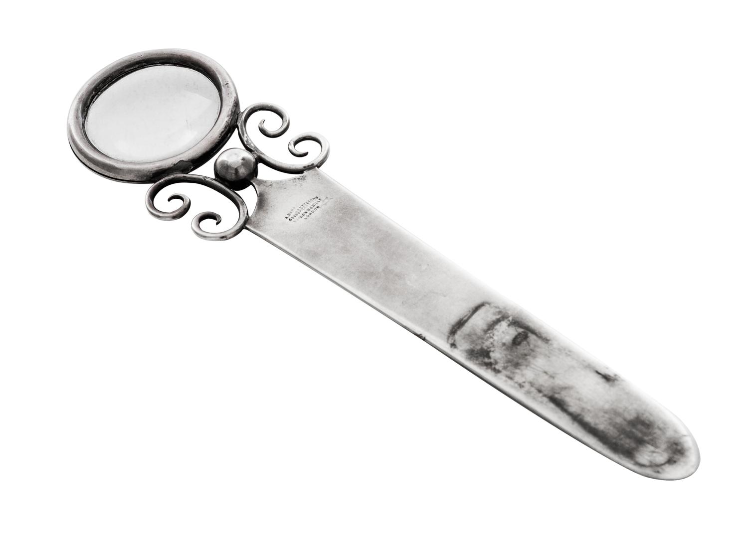 An Edwardian Silver Paper Knife, Andrew Barrett & Sons, London, 1902, having a circular handle inset with a magnifier and applied with