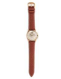 UNIVERSAL GENEVE, 14K YELLOW GOLD REF. 52218 'TRI-COMPAX' TRIPLE DATE CHRONOGRAPH WRISTWATCH