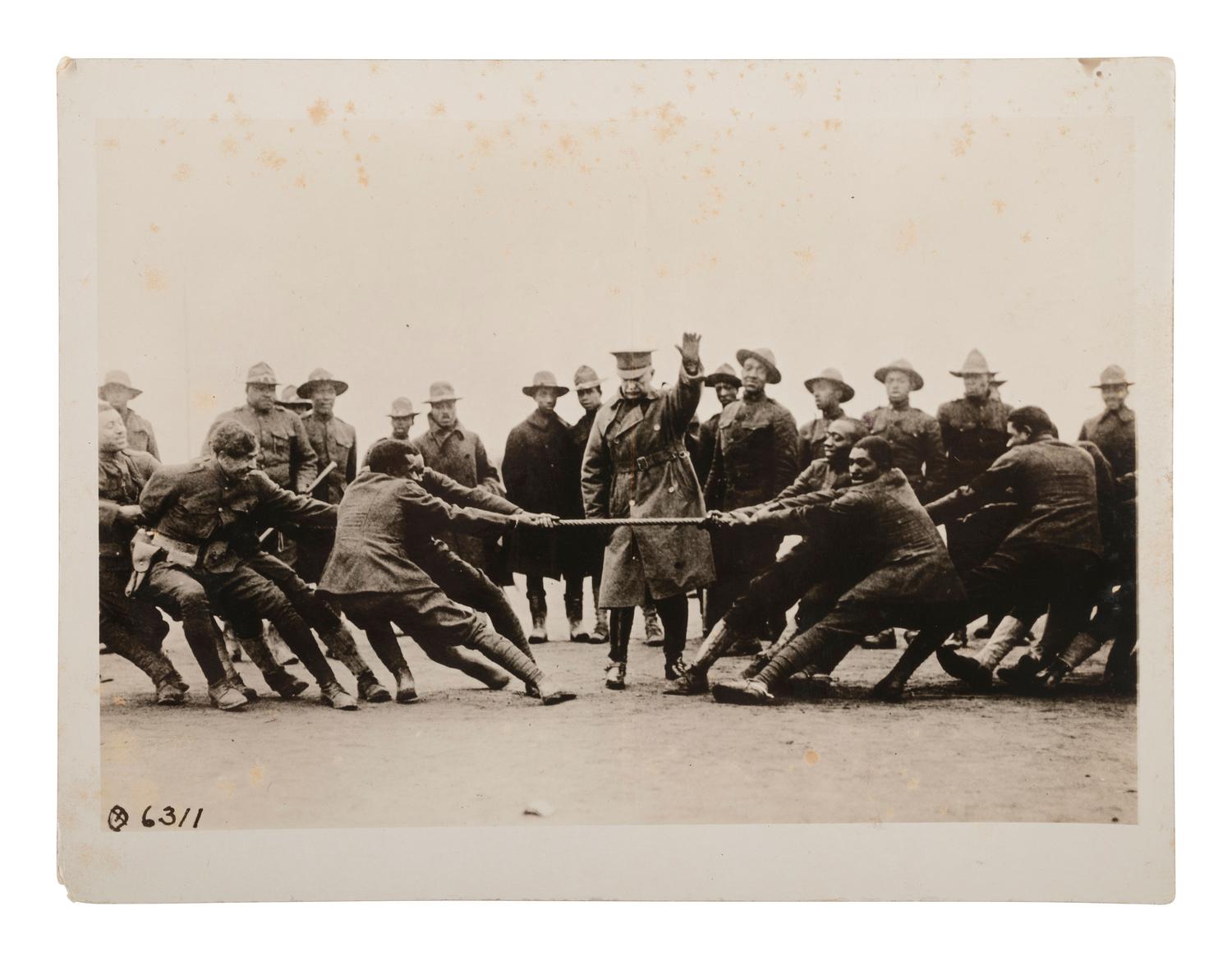 [EARLY PHOTO-WWI] 3 Brown Brothers photos of Black subjects, incl. a soldiers' game of tug-of-war.