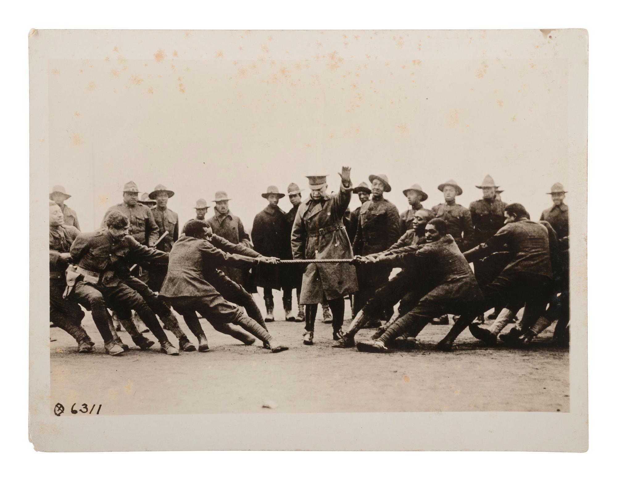 [EARLY PHOTO-WWI] 3 Brown Brothers photos of Black subjects, incl. a soldiers' game of tug-of-war.