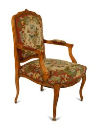 A Louis XV Style Carved Mahogany Fauteuil — 19TH CENTURY