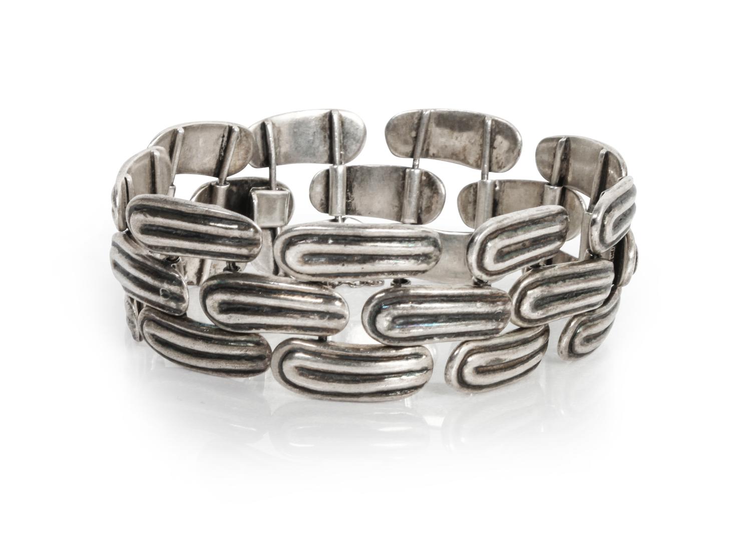 A Mexican Silver Link Bracelet, Los Castillo Length approximately 7 inches.