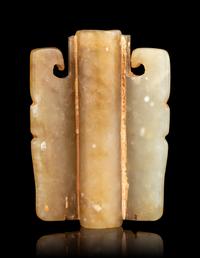 A Small Archaistic Jade Mask-Form Ornament