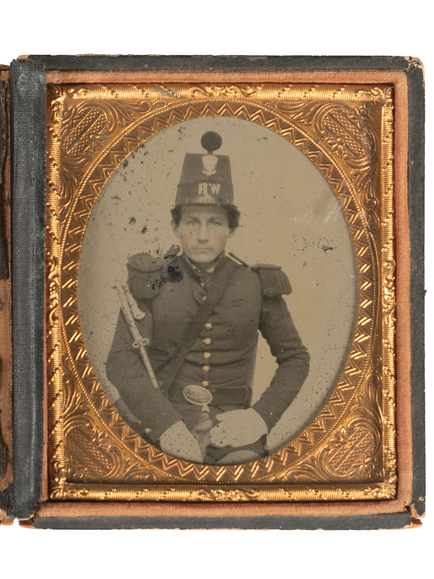 [CIVIL WAR]. Ruby ambrotype portrait of a militiaman wearing 1851 shako with pompon and letters "WR"
