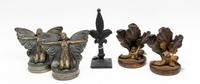 A Group of Five Bookends Height of tallest 8 3/4 inches. — 20TH CENTURY